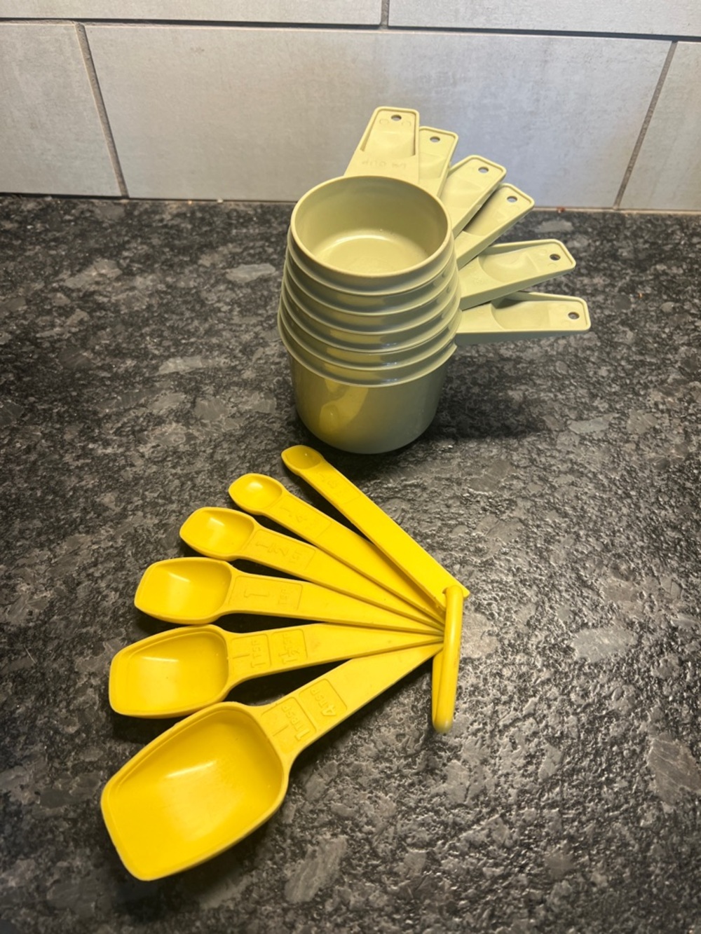 Set of 2 Vintage Tupperware measuring cups and measuring spoons. Great condition